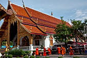 Chiang Mai - The Wat Phra Singh temple. The large Viharn Luang (main prayer hall) with an intricately carved front.  